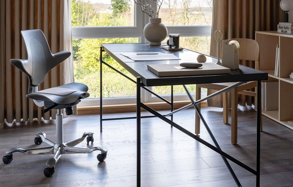 capisco puls brown chair in home office environment with large windows