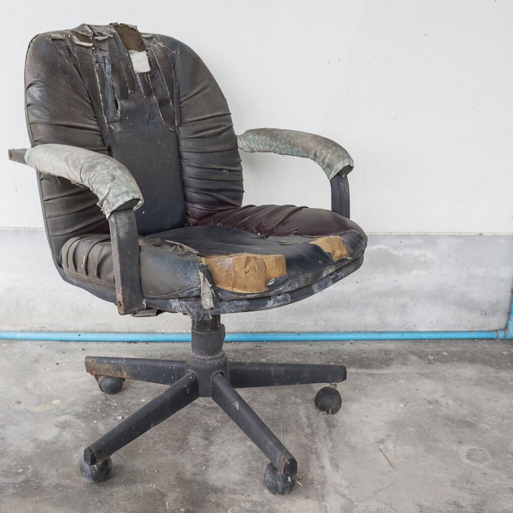 Black Office chair old damage leather and dirty, time to replace